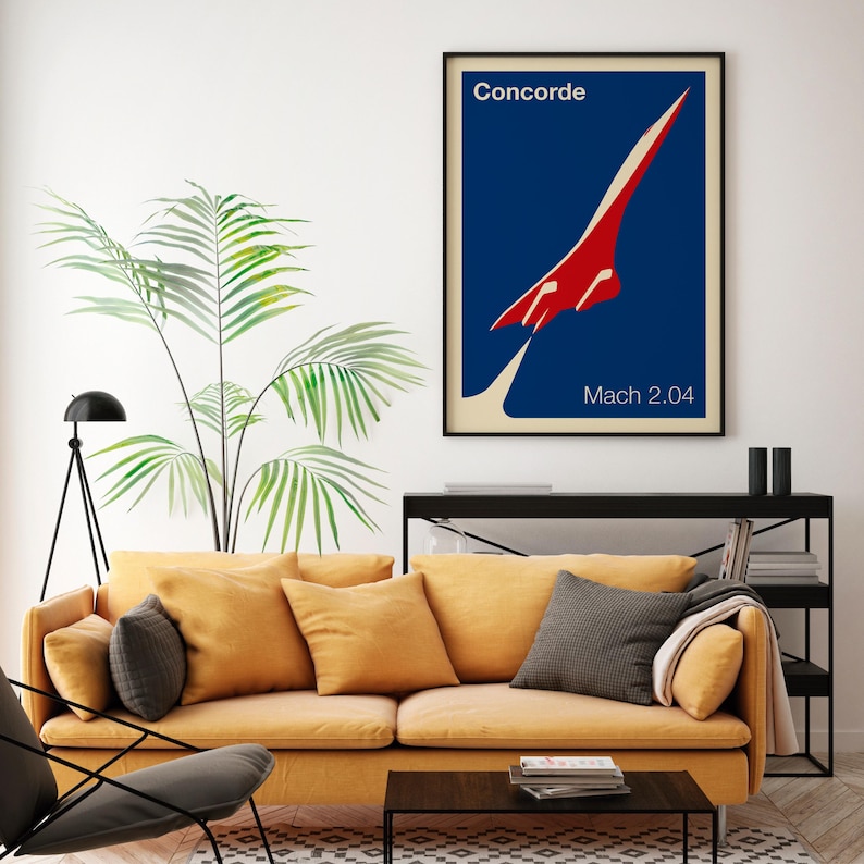 May include: A vintage-style poster featuring a red and white Concorde supersonic jet against a blue background. The poster reads "Concorde" and "Mach 2.04".