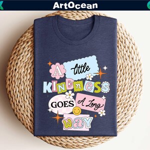 a t - shirt that says a little kindness goes a long way