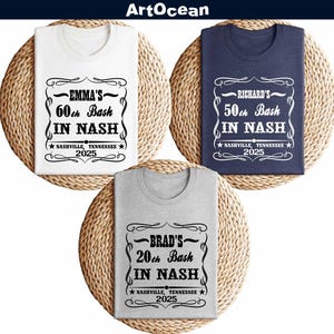three t - shirts on a rope hanger