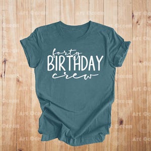 a t - shirt with the words happy birthday crew printed on it