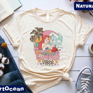 a t - shirt that says summer vibes on it