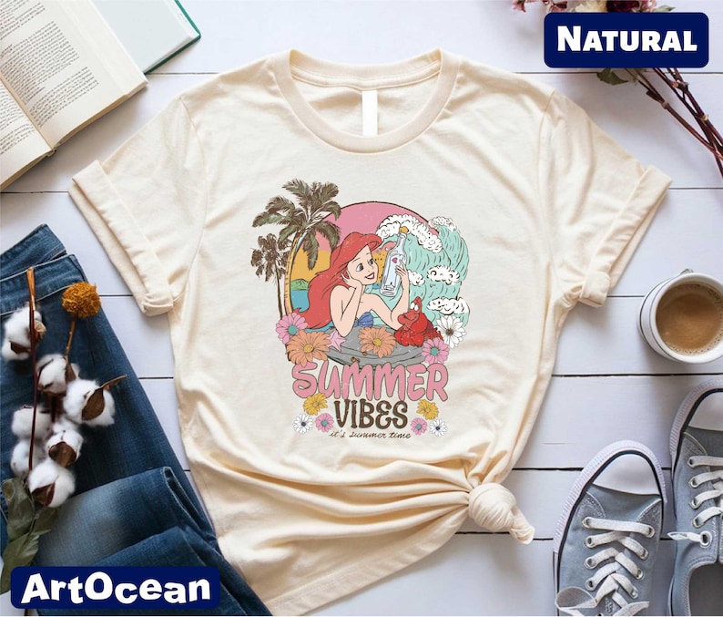 a t - shirt that says summer vibes on it