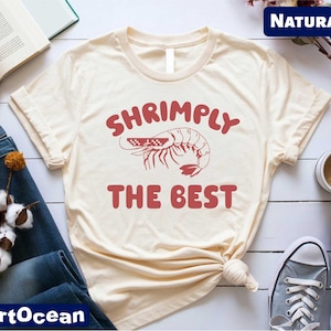 Shrimply The Best T-Shirt, Shrimp Shirt, Sea Food Lover Shirt, Seafood Shirt, Lobster Shirt, Shrimp Lover Tee, Curved Shrimp Meme Shirt