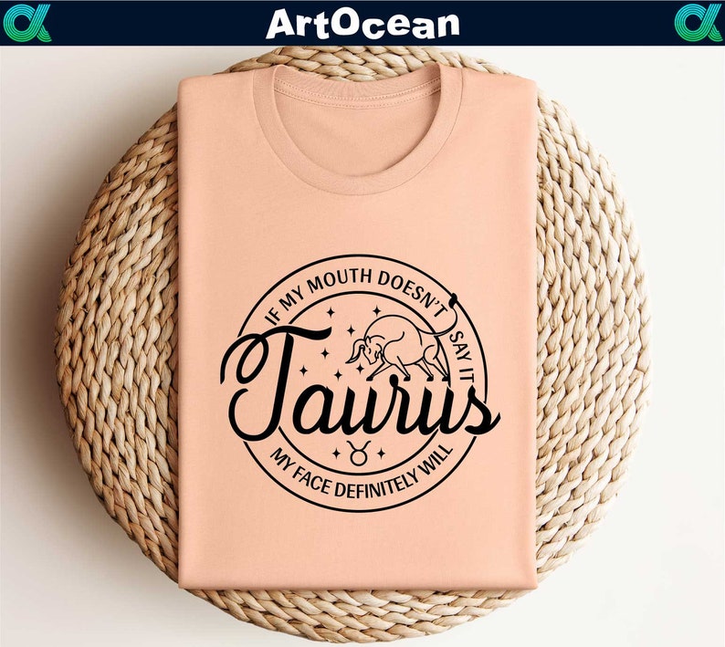 a pink t - shirt with the word taurus printed on it
