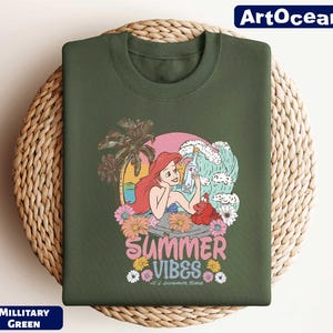 a green shirt with a cartoon character on it