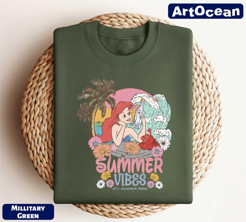 a green shirt with a cartoon character on it