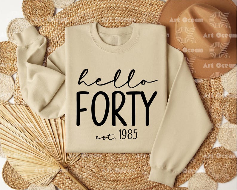 a sweater that says, hello forty est 1965