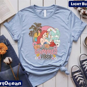 a t - shirt that says summer vibes on it