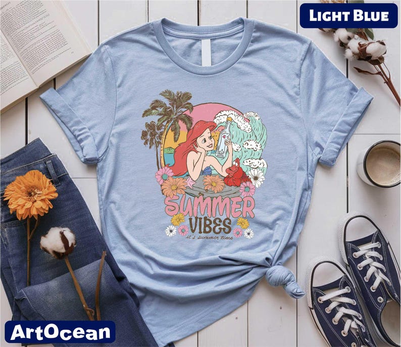 a t - shirt that says summer vibes on it