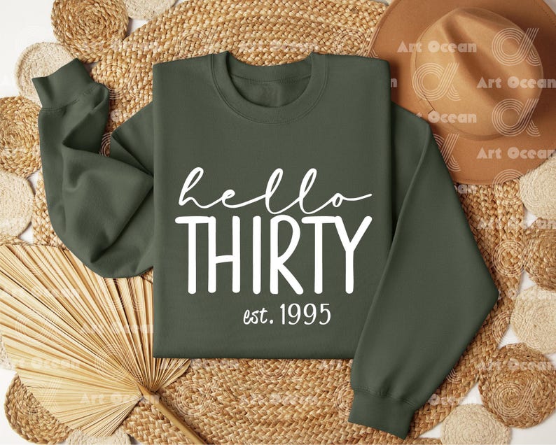 a green sweatshirt with the words hello thirty on it