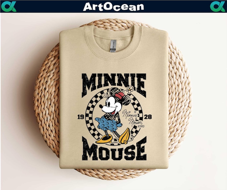 a mickey mouse shirt hanging on a wall