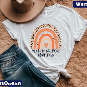 a t - shirt with a rainbow and a heart on it