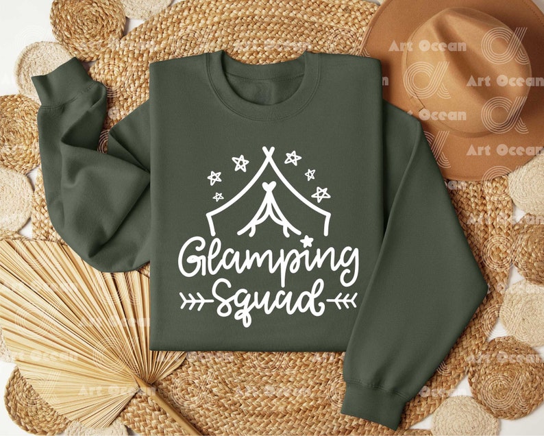 a green sweatshirt with the words glamping squad printed on it