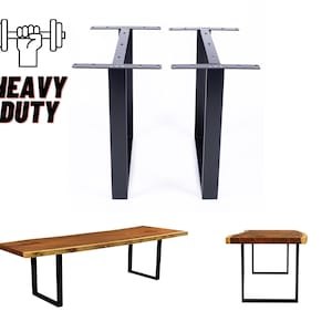 May include: Two black metal table legs with a square design. The legs are shown with a wooden tabletop, creating a table.