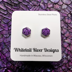 May include: A white ceramic mug with a black handle and the text "But First, Coffee" in a black, bold font. The mug is sitting on a white surface. The mug is approximately 4 inches tall.