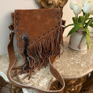 Leather bag with intricate detail
