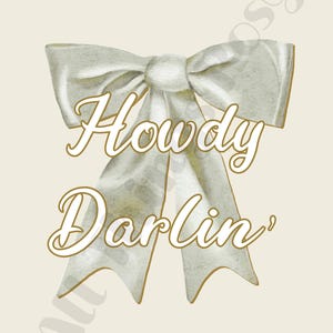 May include: A digital illustration of a white bow with gold trim and the words "Howdy Darlin'" in a script font. The bow is centered on a cream-colored background, creating a vintage aesthetic.