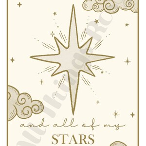 May include: A celestial-themed art print featuring a large starburst in the center, surrounded by smaller stars and stylized clouds. The words "and all of my STARS" are written in a script font below the starburst. The color palette is cream and gold.