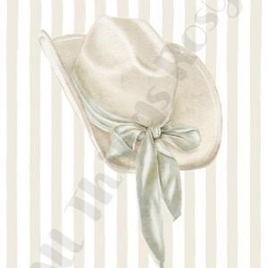 May include: Watercolor illustration of a cream-colored cowboy hat with a light blue ribbon tied in a bow. The hat is set against a background of vertical beige and white stripes. The words "All Things Rosy" are visible in the background.