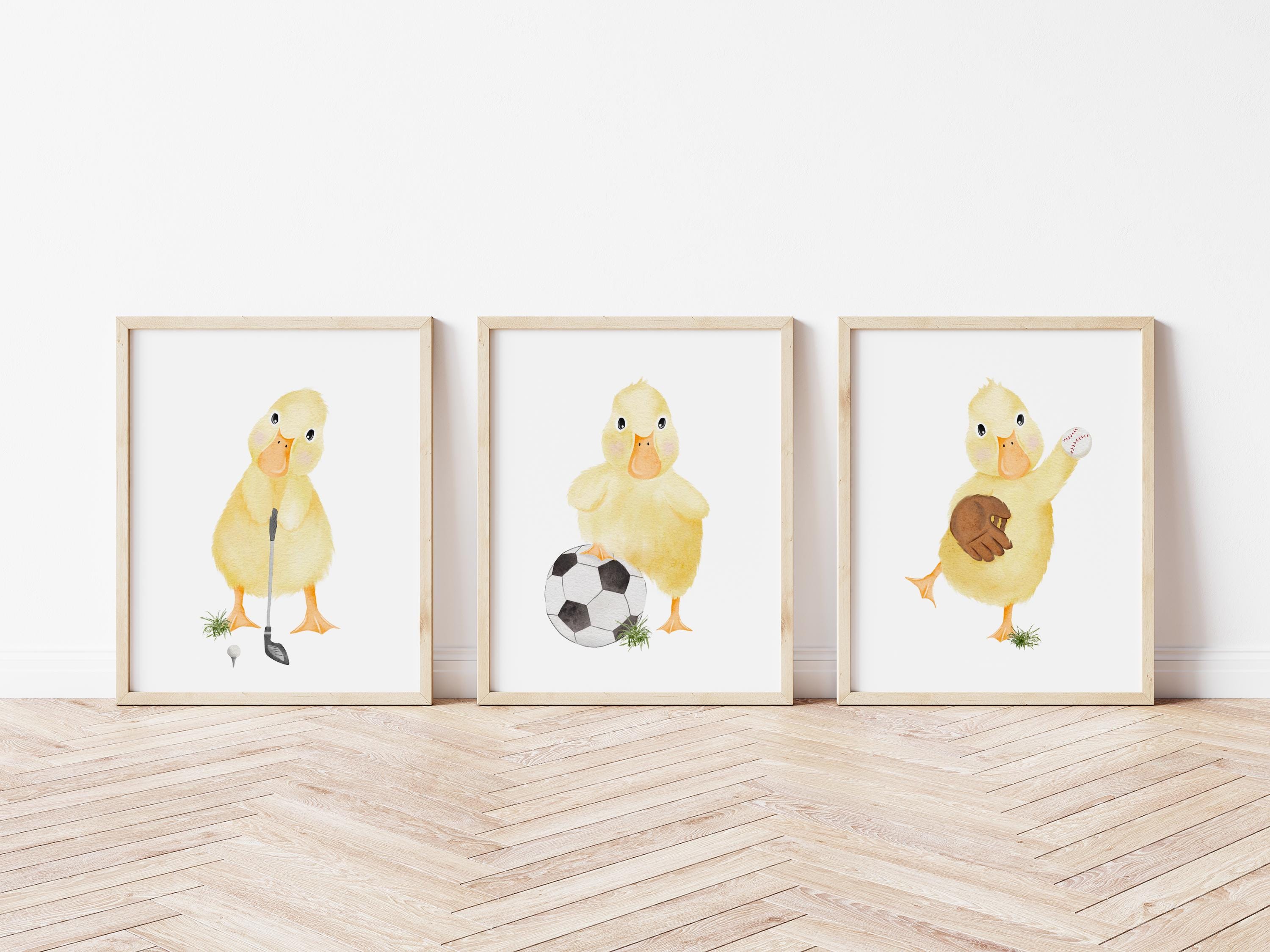 Playful Duck Prints: Children's Sporty Wall Art Set for Nurseries, Golf, Football, and Baseball Fans.