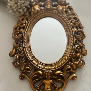 Vintage Gold Cherub Oval Mirror: Gilded Farmhouse Decor