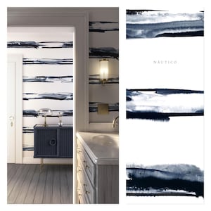 May include: A bathroom interior with a white and blue striped wallpaper featuring abstract brushstrokes. The wallpaper is called "N&aacute;uTico".