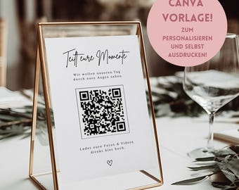 Puede incluir: Un letrero con marco dorado con el texto "Teitt cure Momente" y un código QR. El letrero también incluye el texto "Wir wollen unseren Tag durch eure Augen sehen." y "Ladet eure Fotos & Videos direkt hier hoch." Un círculo rosa con el texto "CANVA VORLAGE!" en el fondo.
