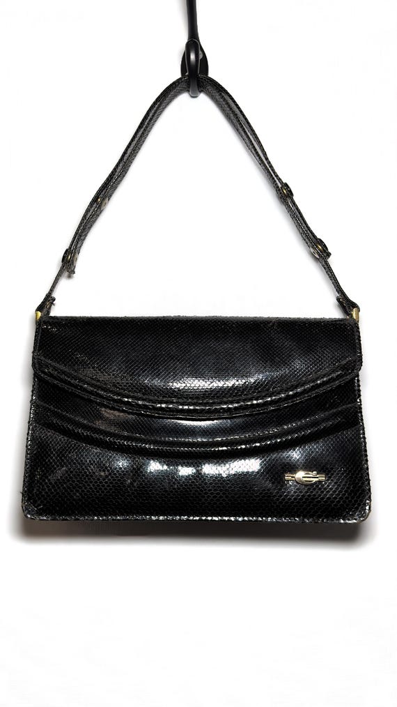 楽天市場】イタリア製 レザー ビジネス トートバッグ レディース ハンドバッグ 本革 ブラック フォーマル バッグ 黒 革 ビジネストート ビジネス  ショルダーバッグ 軽量 斜めがけ ビジネス バッグ 肩掛け バッグ 通勤 バッグ 冠婚葬祭 結婚式 セレモニー 2way バッグ ... 黑い革のハンドバッグです