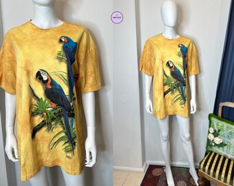 Vintage 1990s The Mountain camiseta guacamayo loros teñidos impresos en EE.UU. L Excelente