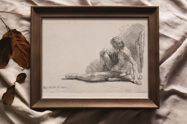 K&ouml;nnte beinhalten: Eine gerahmte Schwarzwei&szlig;zeichnung einer sitzenden Figur. Die Figur ist nackt und zeigt dem Betrachter den R&uuml;cken. Die Zeichnung ist signiert mit "Rembrandt F. 1646."