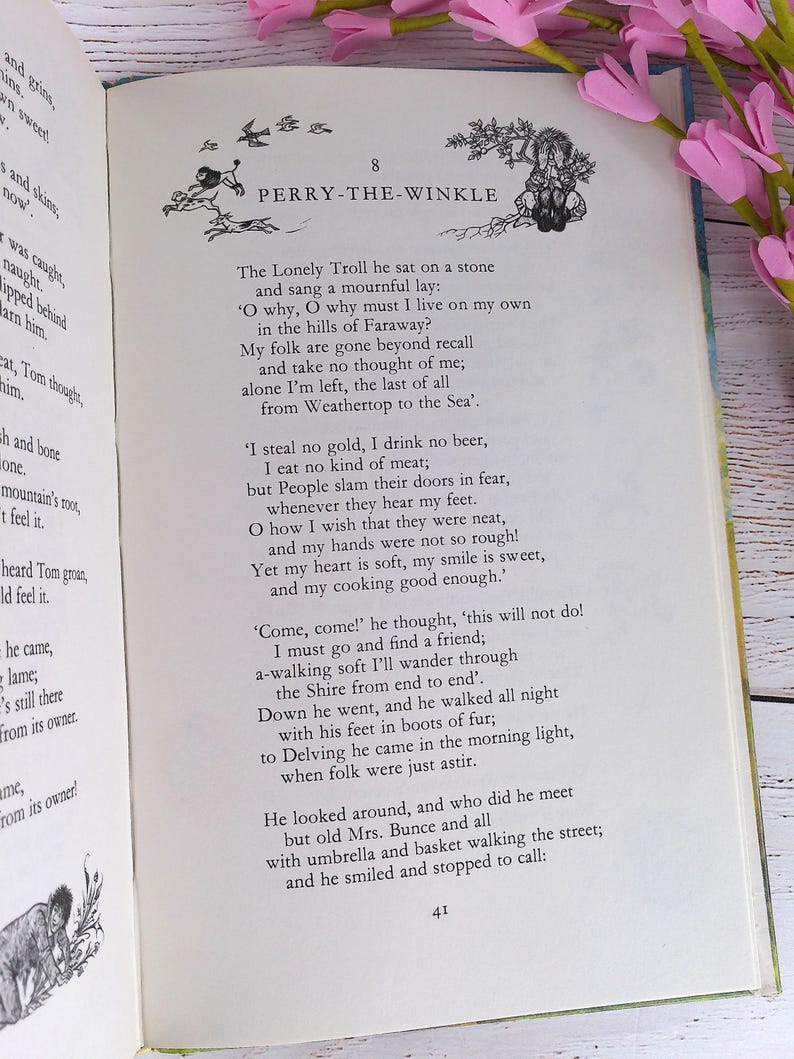 Op de afbeelding: Open boekpagina met tekst en illustraties. De titel "PERRY-THE-WINKLE" staat bovenaan, met een gedicht eronder. Het paginanummer "41" staat onderaan. Roze bloemen zijn op de achtergrond te zien.