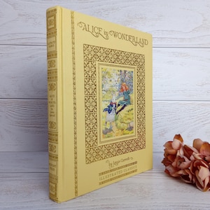 Lewis Carroll, Alice in Wonderland: Rare Multi-Illustrator Edition, Yellow Gilt Hardcover Book