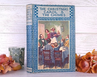 チャールズ・ディケンズ著、1943年刊『クリスマス・キャロル』と『鐘』、青い布装ハードカバー、挿絵入り、オリジナルの珍しいダストジャケット付き