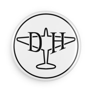 May include: A white button with a black outline and a black airplane with the letters "DH" inside.