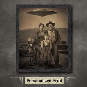 May include: Sepia-toned framed print depicting a family with an alien and a UFO. The family is dressed in vintage attire, set against a backdrop of mountains. The print includes the text "Personalized Print" at the bottom.