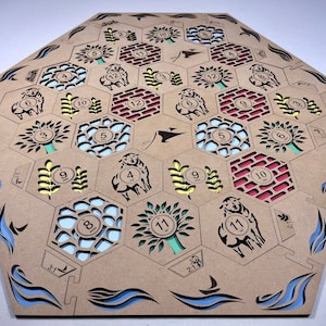 May include: A hexagonal wooden game board with various colored hexagonal tiles. The tiles feature different symbols, including trees, sheep, wheat, and brick. The board is designed for a game of strategy and resource management.