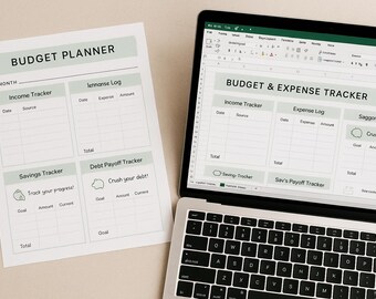 May include: A budget planner and a laptop displaying a budget and expense tracker. The planner includes sections for income, savings, and debt payoff. The laptop screen shows a spreadsheet with similar financial tracking categories. Both are on a neutral surface.