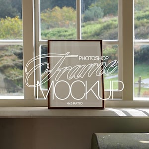 May include: A brown wooden frame with a white mat and a white background. The frame is sitting on a white windowsill. The text "PHOTOSHOP FRAME MOCKUP 4x5 RATIO" is printed on the frame.