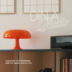 May include: A bright orange mushroom-shaped lamp sits on a black shelf with a record player and a stack of books. The text "DINA Ratio" is written in white on the wall behind the lamp. The text "Compatible with Photoshop CS6 and newer versions only." is written below the shelf.