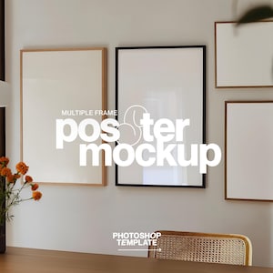 May include: A wall with multiple framed posters. The frames are in various sizes and styles, including wood and black. The text "MULTIPLE FRAME poster mockup PHOTOSHOP TEMPLATE" is visible. A vase of orange flowers sits on a wooden table.
