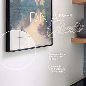May include: A black framed painting with a watercolor-style landscape scene. The painting is hanging on a white wall with a text overlay that reads "DIN A FRAME Ratio".