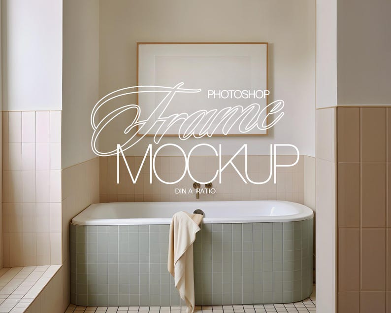 May include: A bathroom scene featuring a rectangular bathtub with a light green tile exterior. A beige towel hangs over the tub's edge. Above, a framed artwork hangs on the wall. The text "Photoshop Frame Mockup" is displayed.