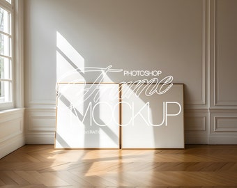 May include: Two empty picture frames with a wood frame and a white mat are leaning against a white wall in a room with hardwood floors. The frames are in a 1:1 ratio. The text "Photoshop Frame Mockup" is written in white on the wall.