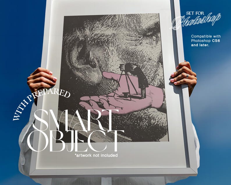 May include: A framed artwork with a black and white illustration of a face and a hand holding a miniature camera. The frame is held against a blue sky. Text on the frame reads "WITH PREPARED SMART OBJECT" and "SET FOR Photoshop".