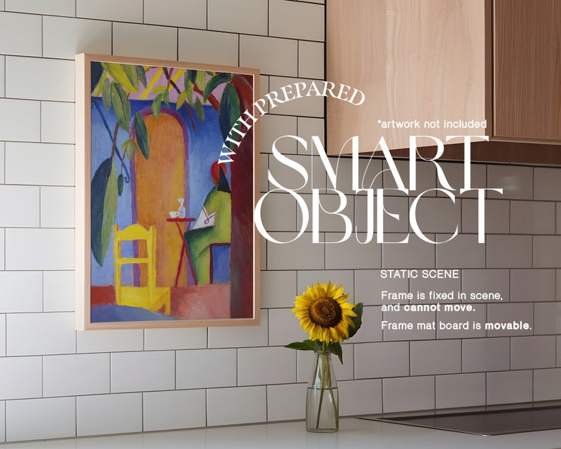 May include: A framed painting of a colorful abstract scene with a person sitting at a table. The frame is made of wood and has a light brown finish. The painting is hanging on a white tiled wall. A sunflower in a glass vase is on a white countertop below the painting. The text "WITH PREPARED SMART OBJECT STATIC SCENE Frame is fixed in scene, and cannot move. Frame mat board is movable." is visible in the image.