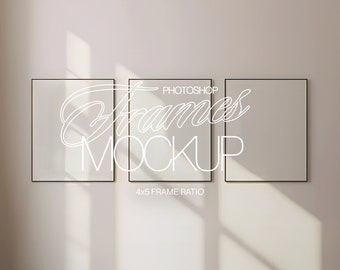 May include: Three black picture frames with a 4x5 frame ratio, arranged horizontally on a light beige wall. The frames are empty and have a subtle shadow cast on the wall. The text "PHOTOSHOP FRAMES MOCKUP" is written in white cursive font above the frames.