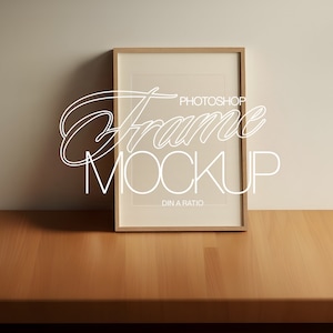 May include: A wooden frame mockup with the text "Photoshop Frame Mockup DIN A Ratio" on a light wood surface.