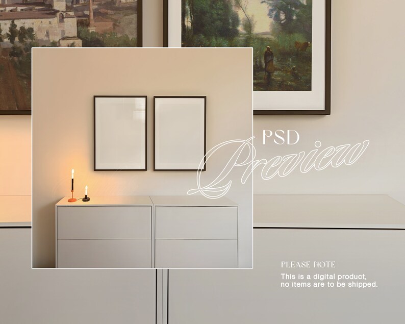 May include: Two black picture frames with white mats hanging on a light beige wall above a white dresser with two drawers. Two candlesticks with lit candles are on the dresser.