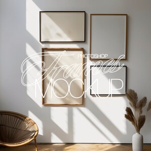 May include: Three empty picture frames on a white wall with a brown wicker chair in the foreground. The frames are all different sizes and have different colored frames. The largest frame is gold, the middle frame is black, and the smallest frame is brown.