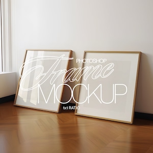May include: Two gold picture frames with white mats on a wooden floor. The frames are empty and ready for your photos. The text "PHOTOSHOP FRAME MOCKUP 1x1 RATIO" is written in white on the floor.
